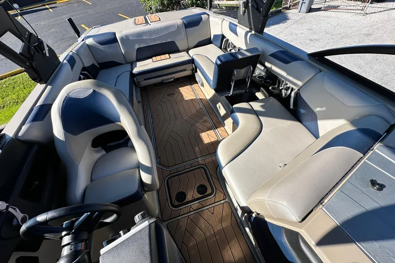 Slide: The Image of 2018 Malibu Wakesetter 23 LSV interior with luxurious seating and stylish design. - 15