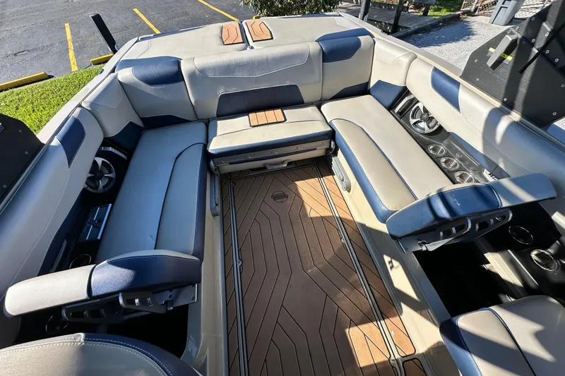 Slide: The Image of 2018 Malibu Wakesetter 23 LSV interior with spacious seating and modern design. - 16