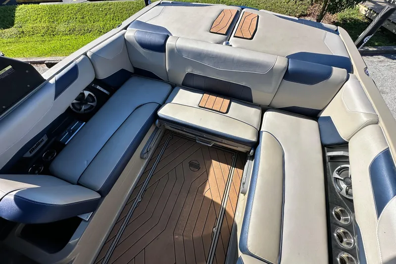 Slide: The Image of 2018 Malibu Wakesetter 23 LSV interior with luxurious seating and stylish design. - 17