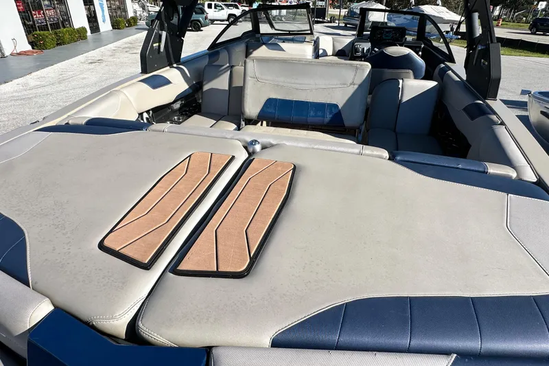 Slide: The Image of 2018 Malibu Wakesetter 23 LSV interior with spacious seating and stylish design. - 19
