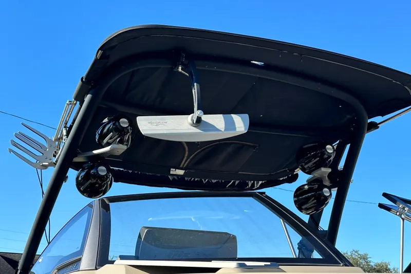Slide: The Image of 2018 Malibu Wakesetter 23 LSV boat with speakers and wakeboard rack. - 25