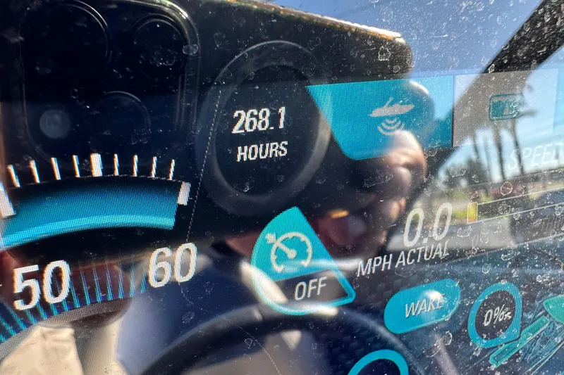 Slide: The Image of Dashboard of 2018 Malibu Wakesetter 23 LSV showing 268.1 hours and speedometer. - 28