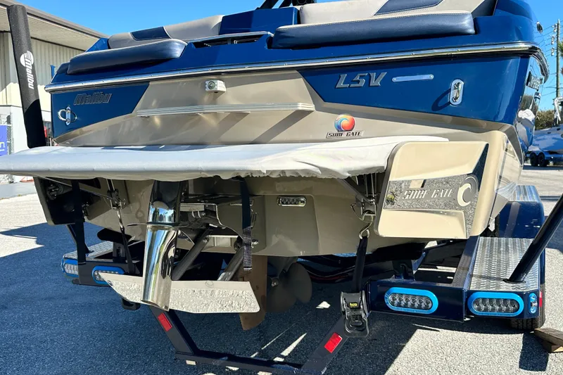 Slide: The Image of 2018 Malibu Wakesetter 23 LSV boat rear view with Surf Gate technology. - 9