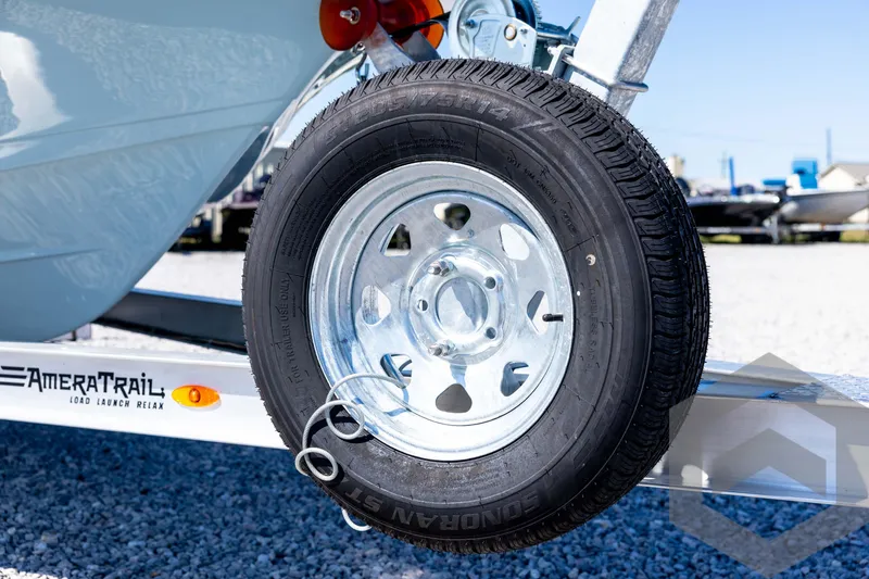 Slide: The Image of Trailer wheel of 2026 Tidewater 2110 Bay Max boat on AmeraTrail trailer. - 10