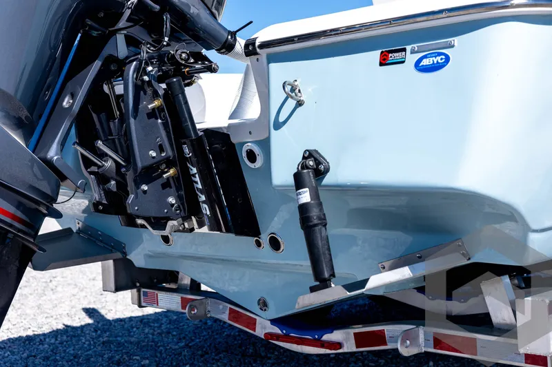 Slide: The Image of 2026 Tidewater 2110 Bay Max boat transom with motor and trailer detail. - 17