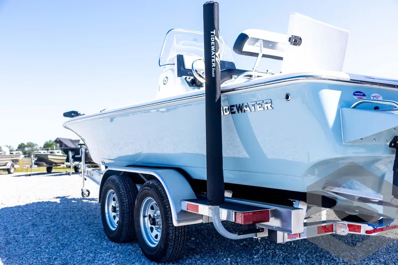 Slide: The Image of 2026 Tidewater 2110 Bay Max boat on trailer, side view, outdoors. - 26