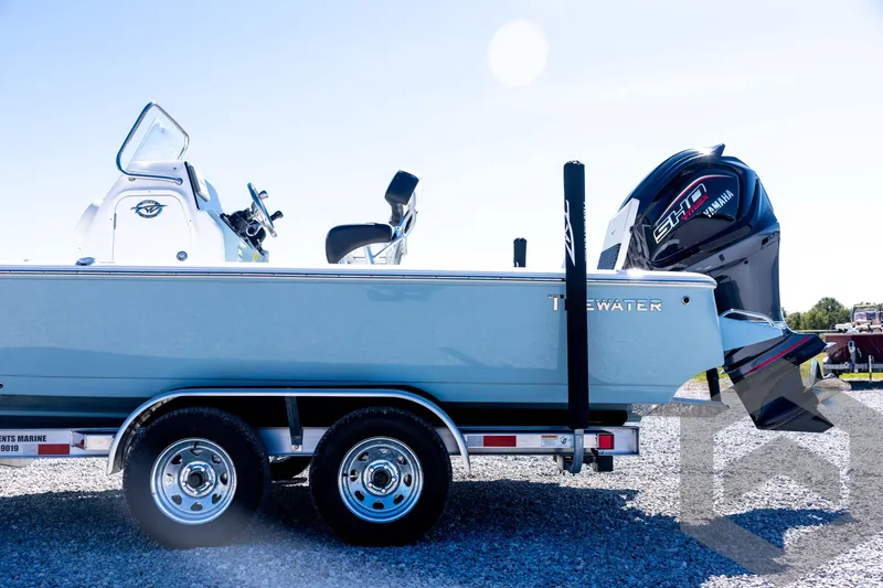 Slide: The Image of 2026 Tidewater 2110 Bay Max boat on trailer with Yamaha engine, sunny day. - 27