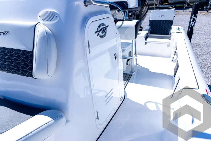 Slide: The Image of 2026 Tidewater 2110 Bay Max boat interior with sleek white seating and modern design. - 43