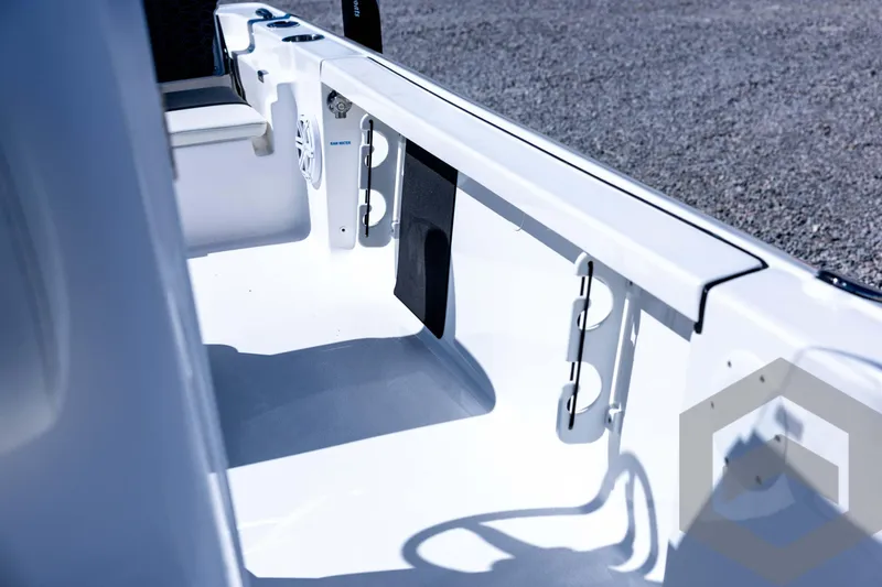 Slide: The Image of 2026 Tidewater 2110 Bay Max boat interior, featuring sleek white design and modern fittings. - 47