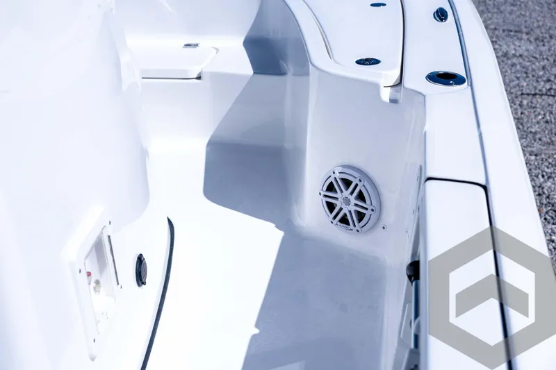 Slide: The Image of 2026 Tidewater 2110 Bay Max boat interior with speaker and sleek design. - 48