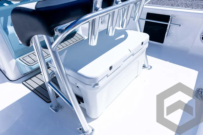 Slide: The Image of 2026 Tidewater 2110 Bay Max boat interior with seating and storage. - 63
