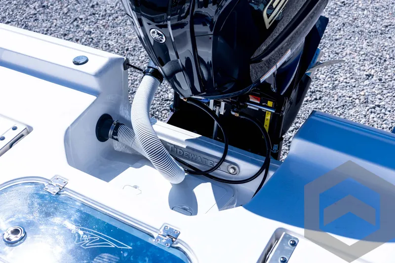 Slide: The Image of 2026 Tidewater 2110 Bay Max boat engine and deck details. - 72