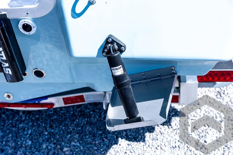 Slide: The Image of 2026 Tidewater 2110 Bay Max boat with trim tab and hydraulic actuator detail. - 76