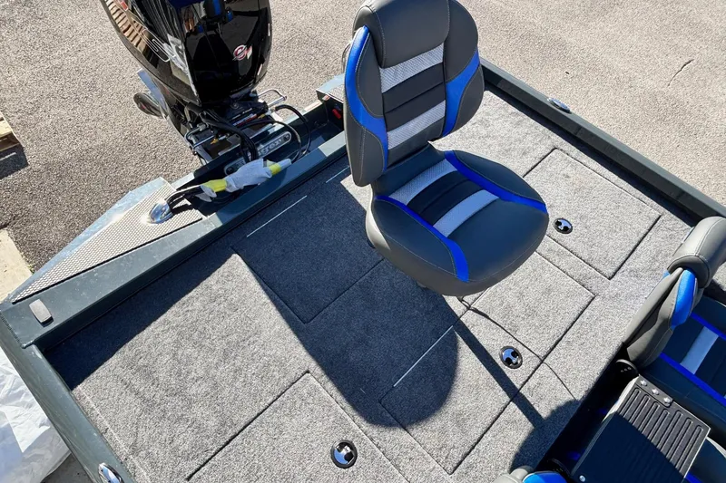 Slide: The Image of 2026 Ranger RT198P boat deck with gray carpet and seating. - 10