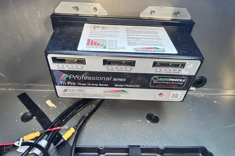 Slide: The Image of Battery compartment of 2026 Ranger RT198P boat with professional series charger. - 12