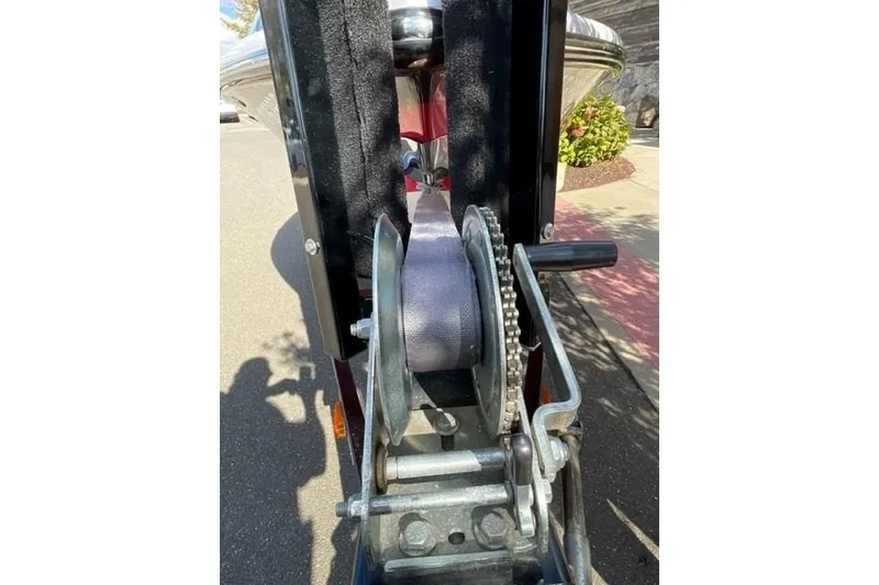 Slide: The Image of Close-up of a 2009 Nautique Ski Nautique 196 boat trailer winch mechanism. - 12