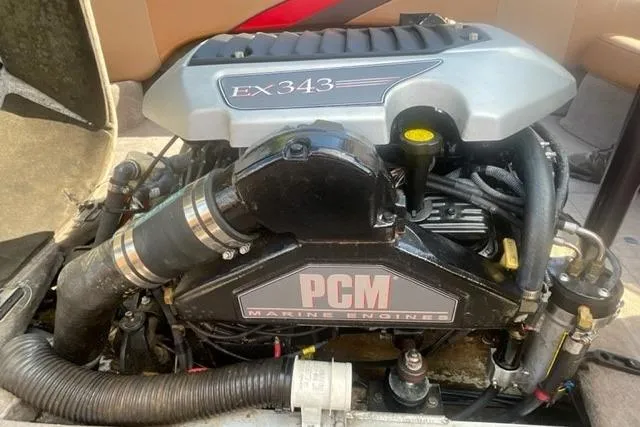 Slide: The Image of 2009 Nautique Ski Nautique 196 PCM EX343 marine engine close-up. - 17