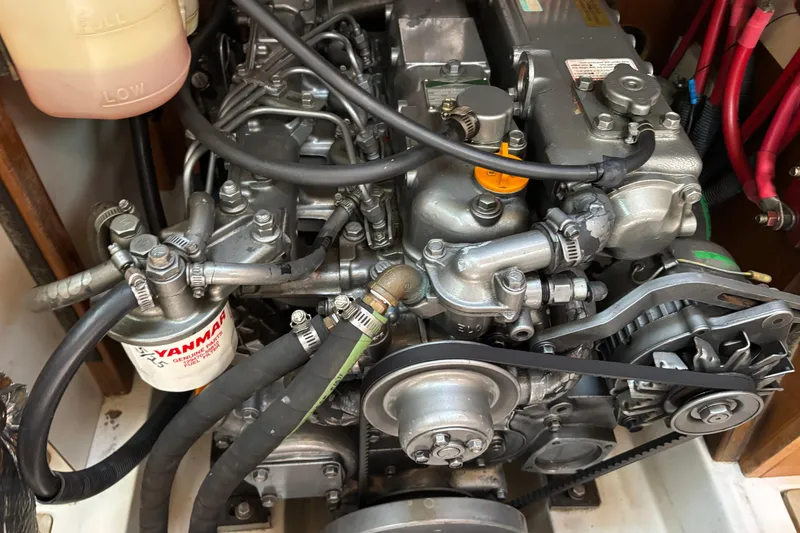 Slide: The Image of Engine of a 2004 Catalina 400 MkII sailboat, featuring Yanmar components. - 17