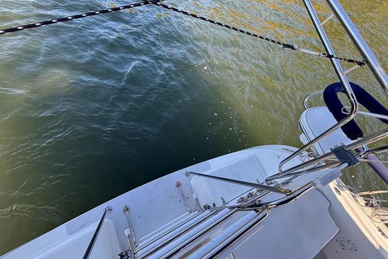 Slide: The Image of Catalina 400 MkII sailboat deck and railing, 2004 model, overlooking water. - 27