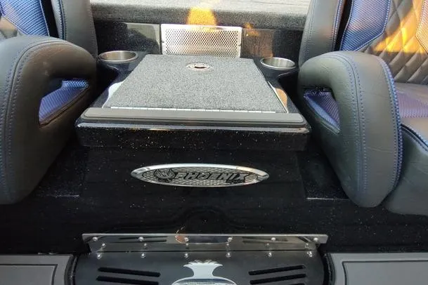 Slide: The Image of Interior of 2026 Phoenix 920 Elite X boat with cushioned seats and storage compartment. - 10