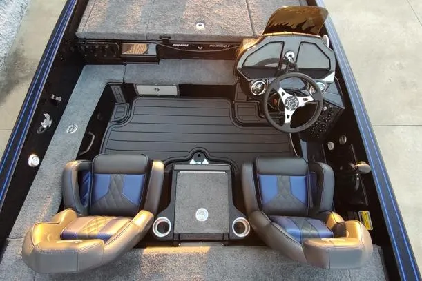 Slide: The Image of Interior of 2026 Phoenix 920 Elite X boat with dual seats and steering console. - 12