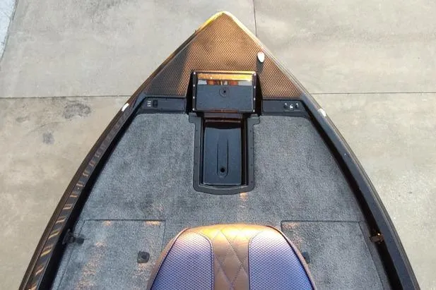 Slide: The Image of Bow of a 2026 Phoenix 920 Elite X boat with carpeted deck and seat. - 3