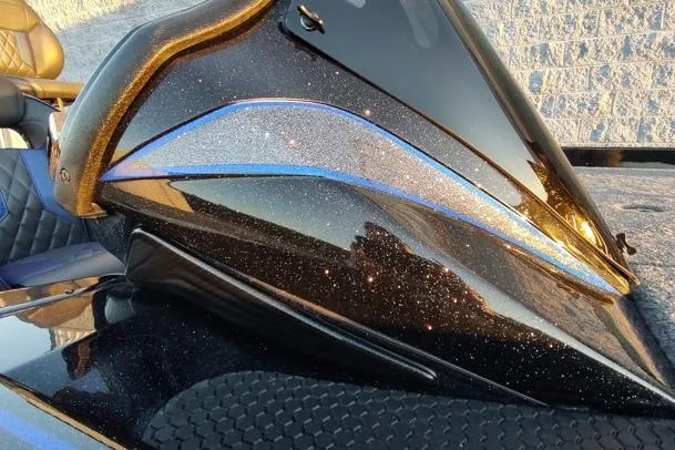 Slide: The Image of 2026 Phoenix 920 Elite X with sleek, glittering black and blue design. - 6