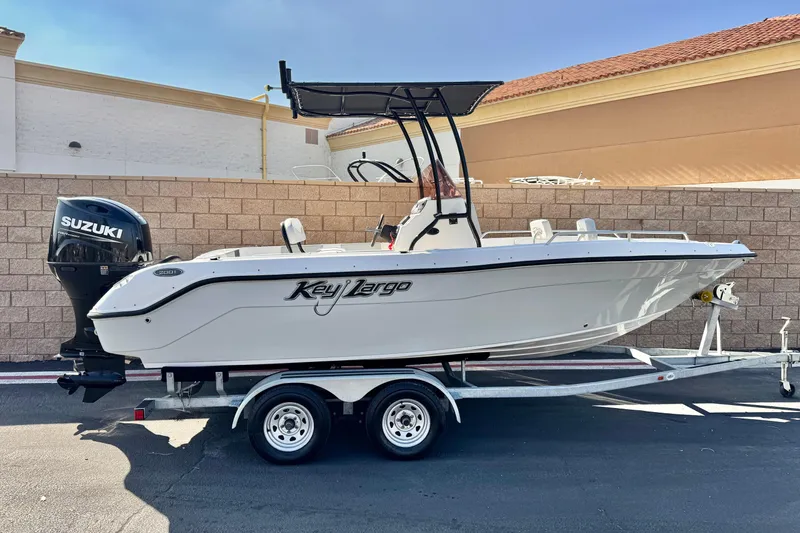 The Image of 2023 Key Largo 2001 CC boat on trailer with Suzuki outboard motor. - 0
