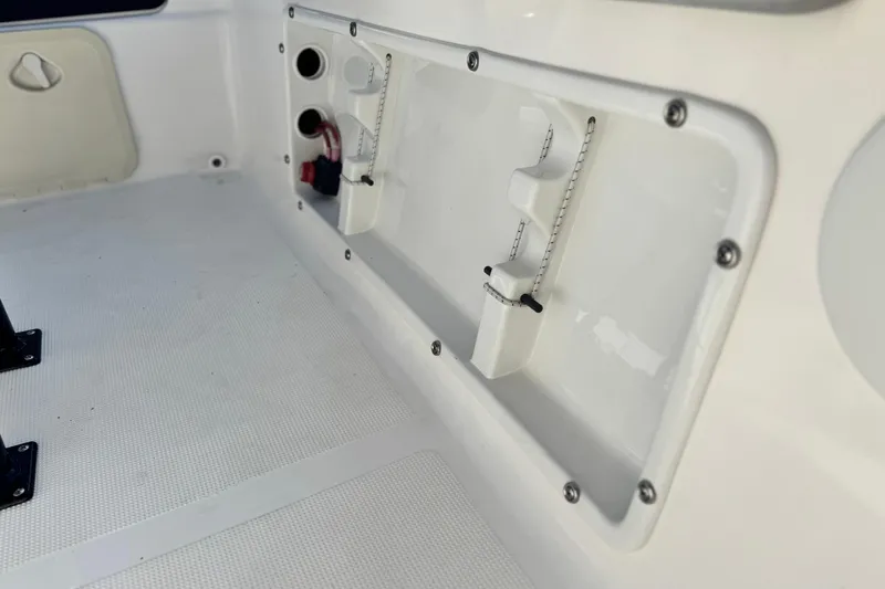 Slide: The Image of Key Largo 2001 CC boat interior, 2023 model, featuring white panel and fittings. - 19