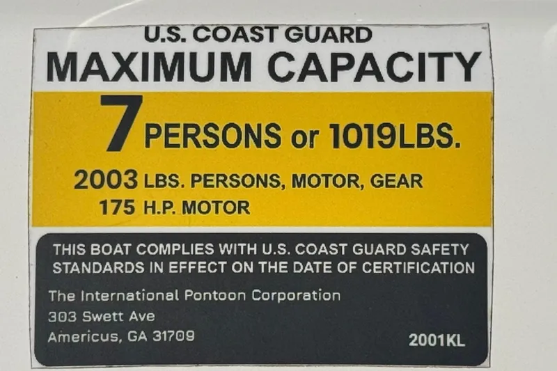 Slide: The Image of Key Largo 2001 CC 2023 boat capacity label: 7 persons, 1019 lbs, 175 HP motor. - 29