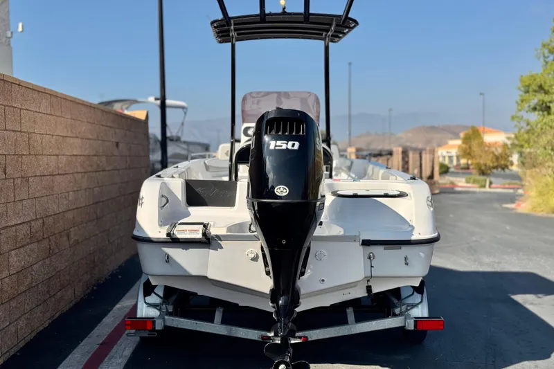 Slide: The Image of Key Largo 2001 CC boat, 2023 model, with 150 HP engine on trailer. - 4