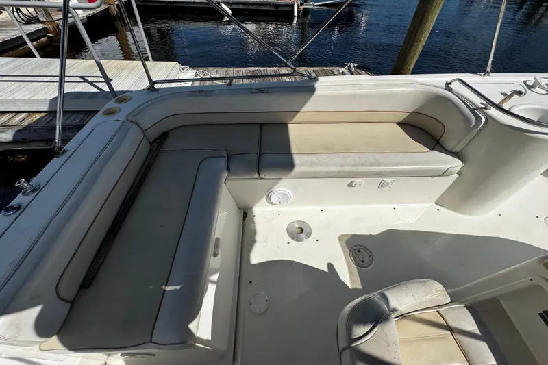 Slide: The Image of Control panel of a 1996 Sea Ray 240 Sundeck boat with switches and knob. - 9