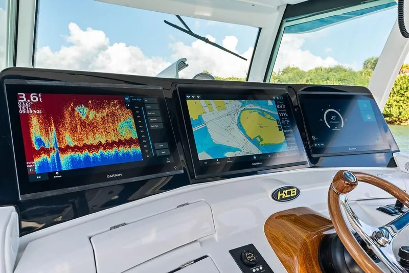 Slide: The Image of HCB 53 Suenos RXV 2025 dashboard with advanced Garmin navigation displays. - 25