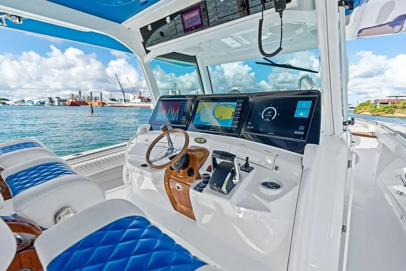 Slide: The Image of Interior view of 2025 HCB 53 Suenos RXV boat with advanced navigation system. - 26