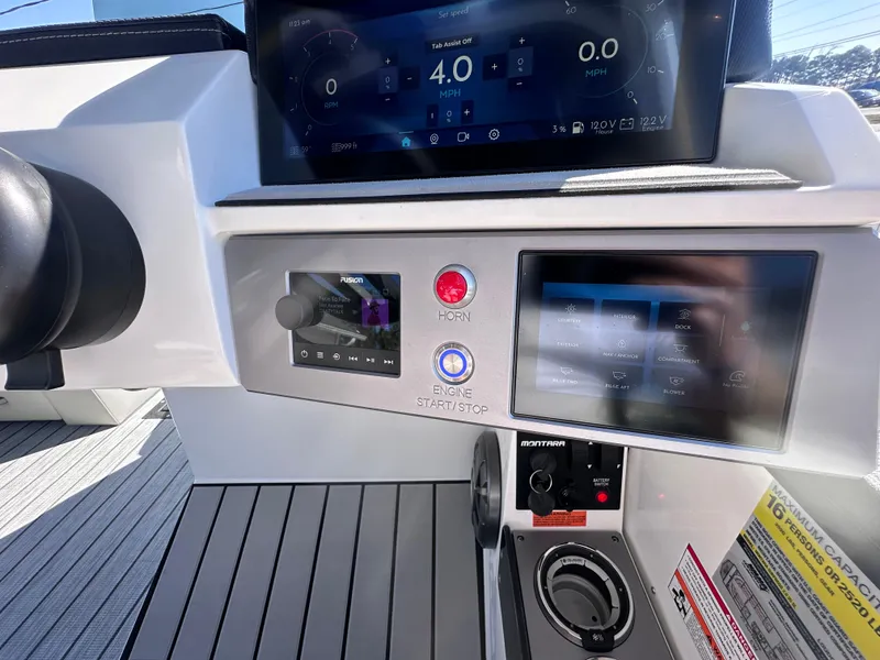 Slide: The Image of 2026 Montara Surf Boss 2.0 SL 23" interior with speaker, control panel, and cup holders. - 10