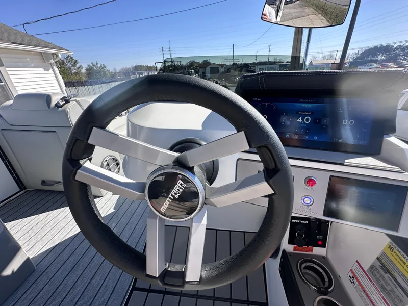 Slide: The Image of Luxurious interior of 2026 Montara Surf Boss 2.0 SL 23" boat with plush seating. - 11