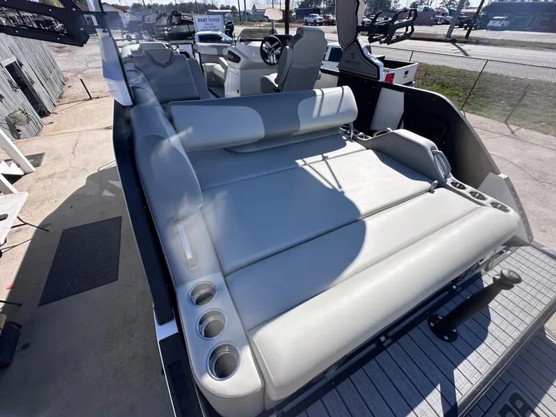 Slide: The Image of 2026 Montara Surf Boss 2.0 SL 23" boat interior with sleek gray seating and modern design. - 12