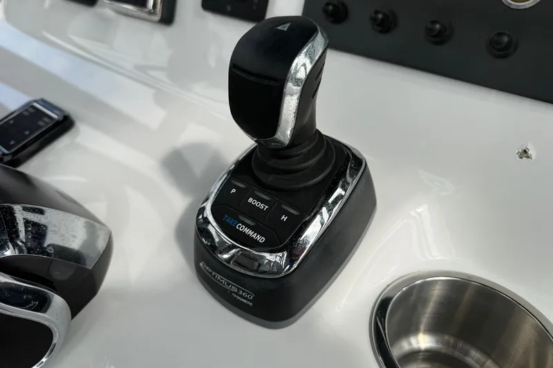 Slide: The Image of Joystick control on 2022 Cape Horn 31 T boat dashboard. - 25