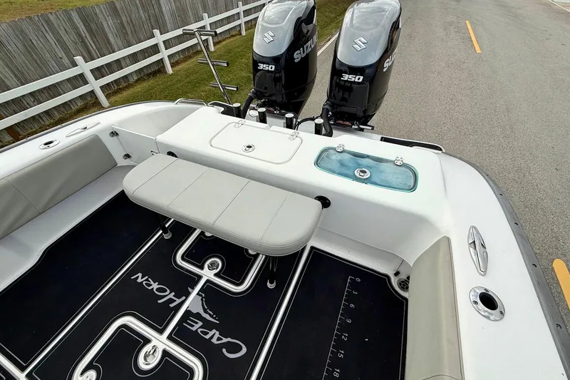 Slide: The Image of 2022 Cape Horn 31 T boat with dual Suzuki engines on a trailer. - 7