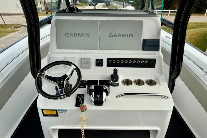 Slide: The Image of 2022 Cape Horn 31 T boat on trailer, front view, clear sky background. - 11