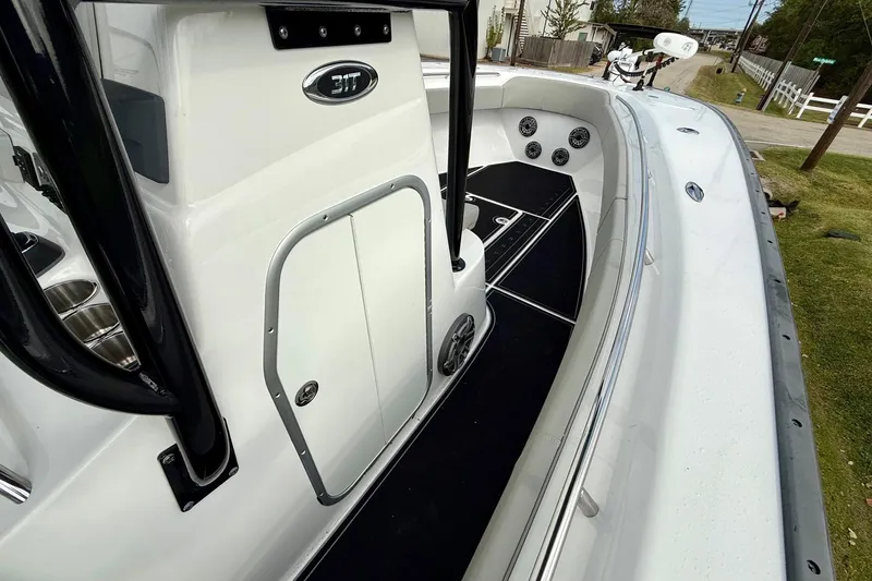 Slide: The Image of 2022 Cape Horn 31 T boat interior with dual captain's chairs and steering wheel. - 14