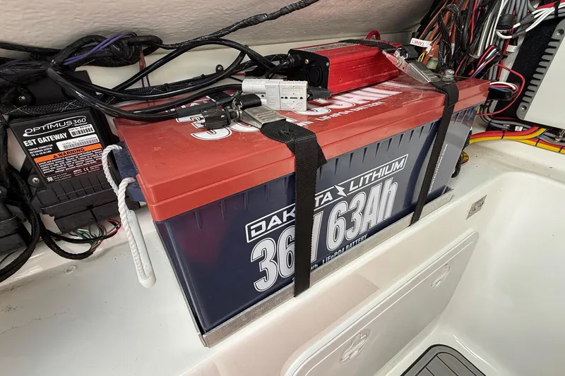 Slide: The Image of Icom VHF Marine IC-M510 radio on 2022 Cape Horn 31 T boat dashboard. - 24