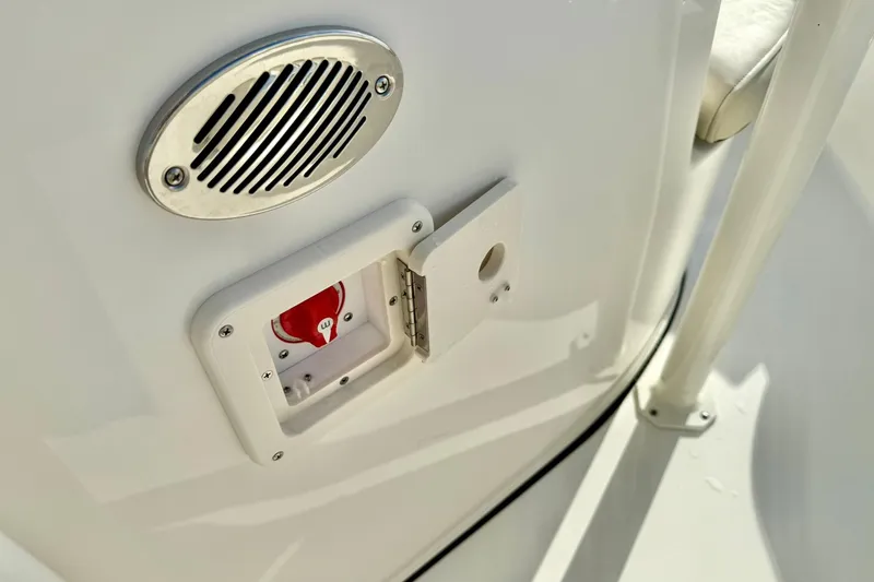 Slide: The Image of Close-up of a 2026 Key West 203 FS boat's control panel and speaker. - 23