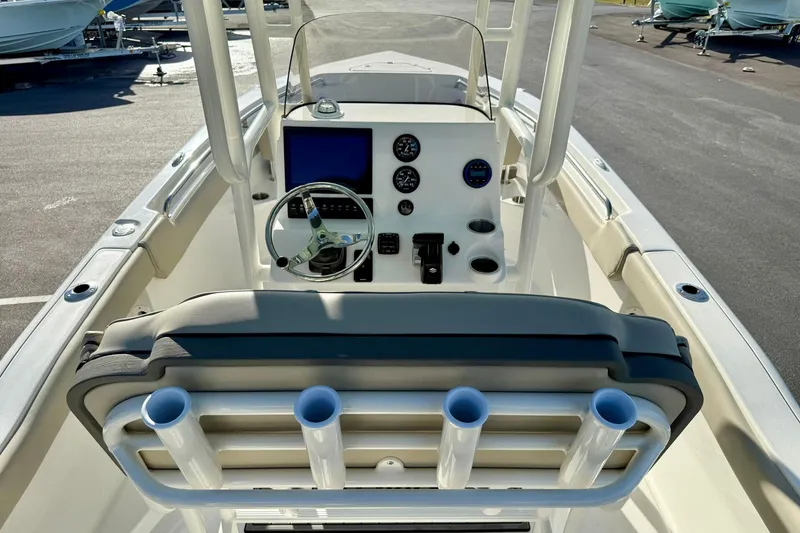 Slide: The Image of 2026 Key West 203 FS boat dashboard with steering wheel and gauges. - 28