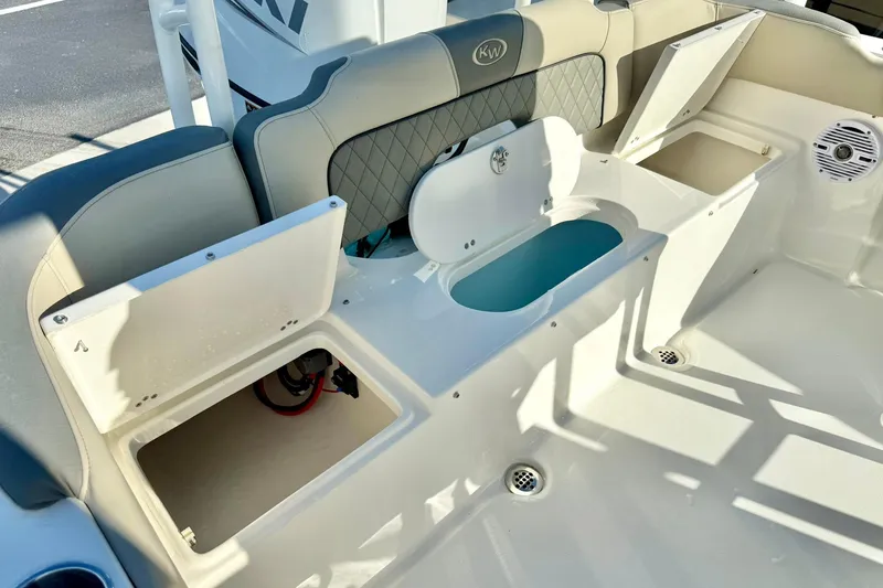 Slide: The Image of 2026 Key West 203 FS boat interior with storage compartments and seating. - 32