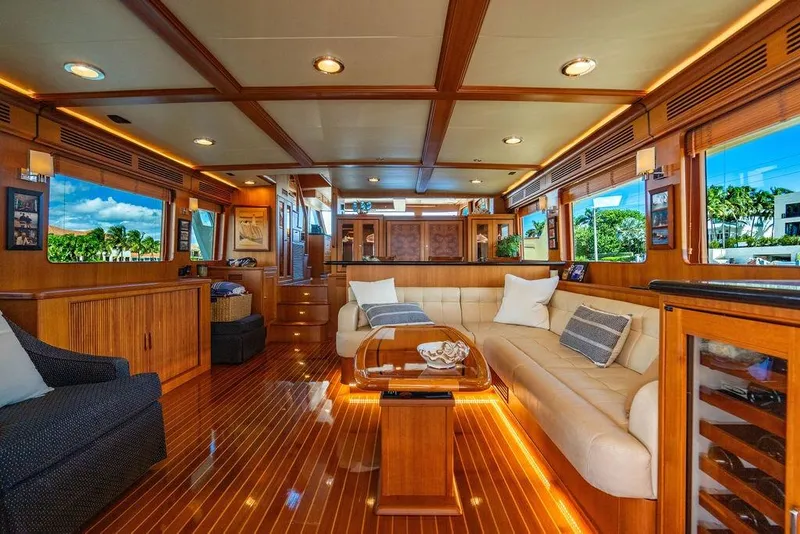 Slide: The Image of Luxurious interior of 2015 Marlow 66E-CB yacht with elegant wood finishes and plush seating. - 12