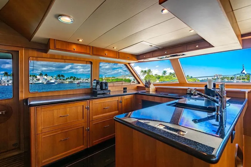 Slide: The Image of Luxurious kitchen interior of 2015 Marlow 66E-CB yacht with ocean view. - 18