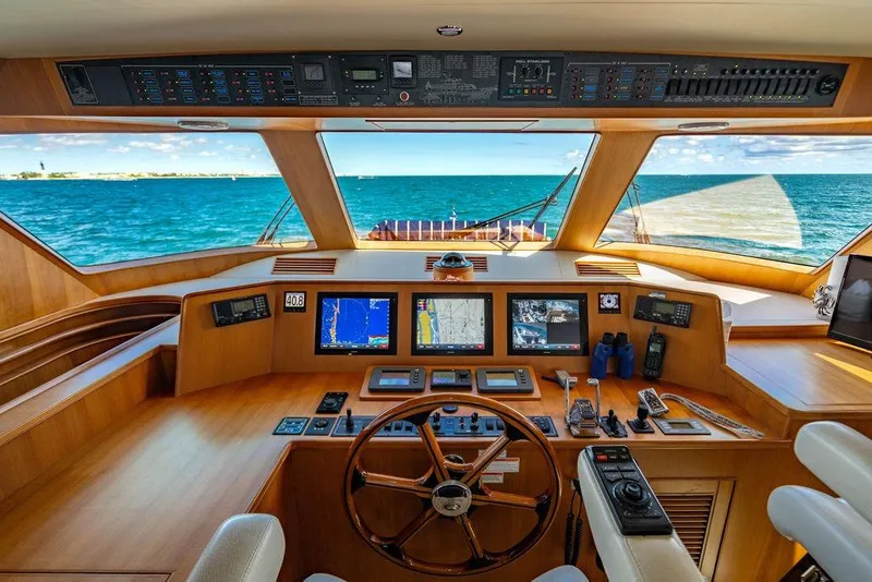 Slide: The Image of Luxurious Marlow 66E-CB 2015 yacht helm with ocean view and advanced navigation systems. - 39