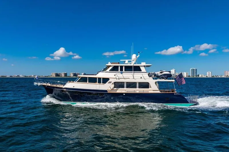 Slide: The Image of Luxury Marlow 66E-CB yacht cruising on open water, 2015 model. - 6