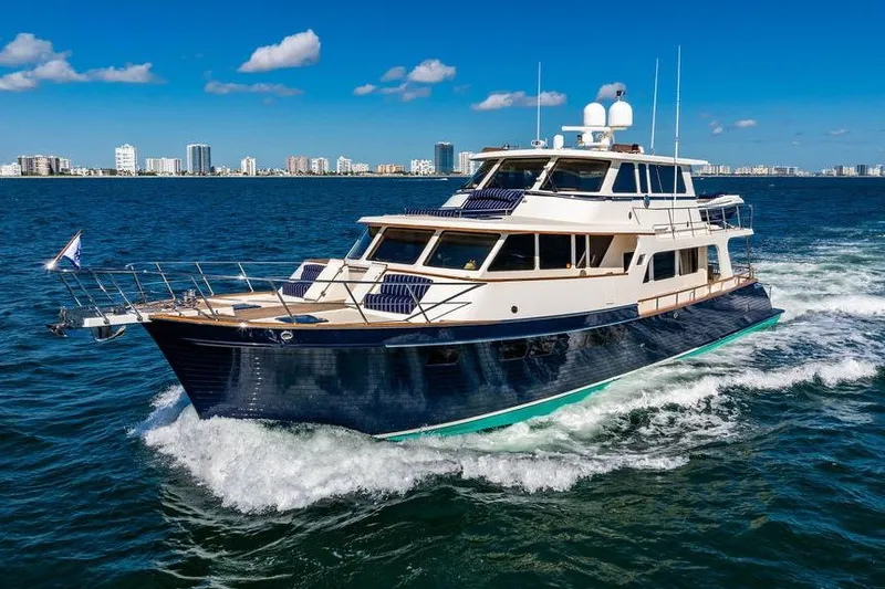Slide: The Image of Luxury Marlow 66E-CB yacht cruising on open water, 2015 model. - 7